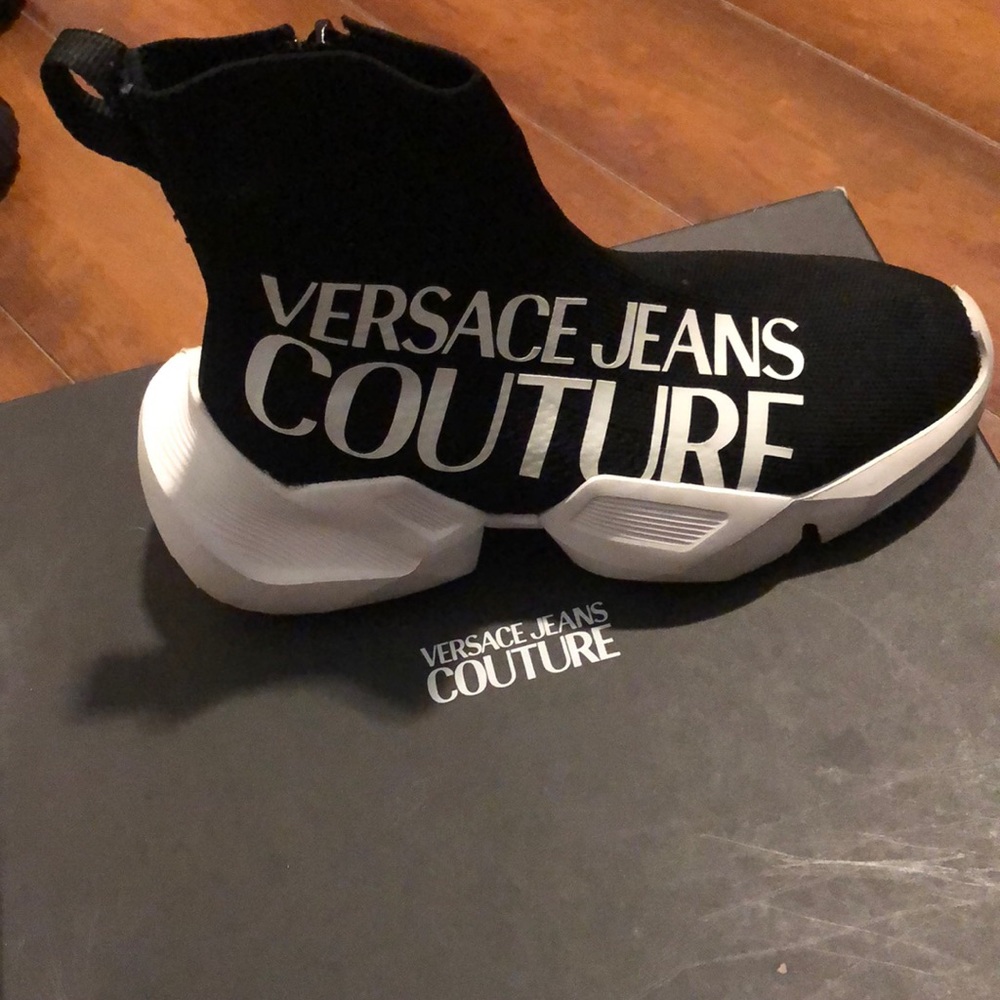 Black and white versace shoes about a size 5 1/2 still good condition